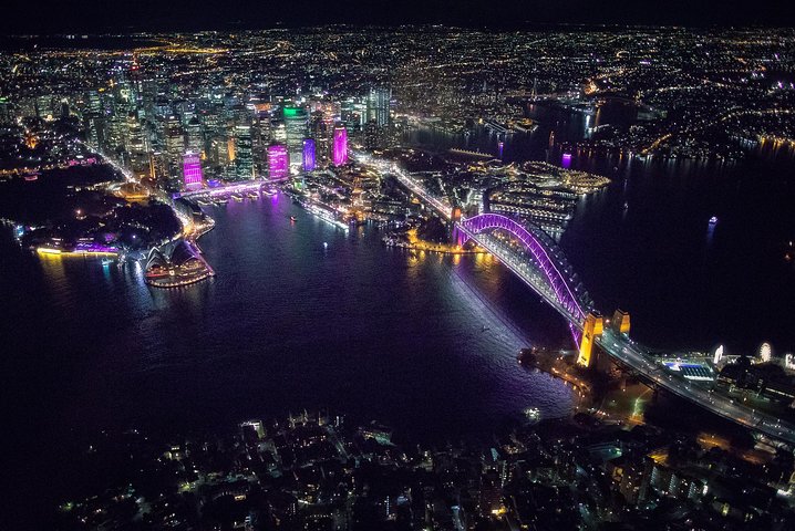 Volez de nuit : tour privé en hélicoptère dans le port de Sydney